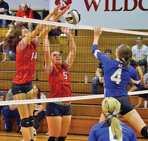 At the net » Times photo by Kendrick Jesionowski