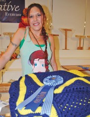 Jennifer Stuckey of Kenton crocheted the grand champion afghan at the 2018 Hardin County Fair. The blue and yellow entry was a favorite with the judge.