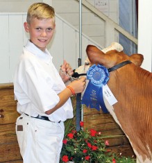 Ethan Lawrence, son of Don and Beth Lawrence, placed first in junior dairy showmanship during Wednesday’s dairy show. Ethan is home schooled and is a member of the Liberty Belles and Boys 4-H club.