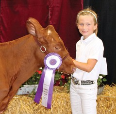 Grace Lawrence, daughter of Don and Beth Lawrence, won junior champion Milking Shorthorn during Wednesday’s dairy show. Grace is home schooled and is a member of the Liberty Belles and Boys 4-H club.