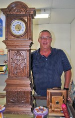 Keith Kissling of Kenton was recognized for creating a wooden miniature grandfather's clock in the woodworking division of the fine arts show. He wooden, antique camera clock was selected as the reserve champion. Kissling was competing in the professional division of the show.