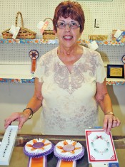 Linda St. Clair brought home two championship titles. Her bracelet was selected as a grand champion in the fine arts competition and a greeting card brought home a reserve title.