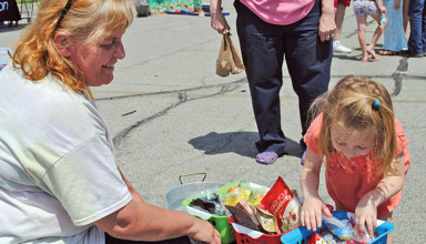 Picking a prize at Crusaders' carnival