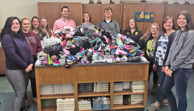 Kenton-OHP FFA members gather around results of sock drive